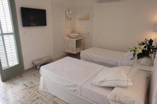Katil atau katil-katil dalam bilik di Juanita Hostal