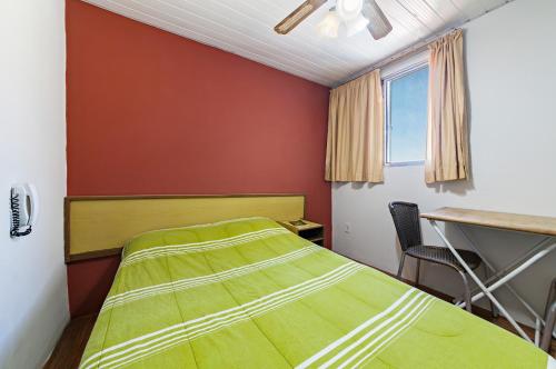 Llit o llits en una habitació de Hotel São Paulo