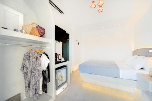 Emerald Collection Suitesにあるベッド