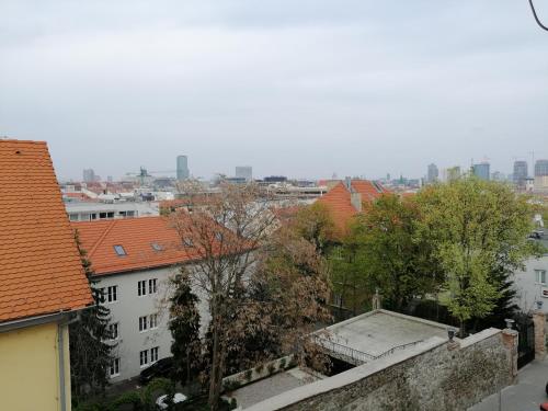 a view of a city with buildings and trees at PÁLFFY in Bratislava