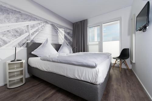 Postel nebo postele na pokoji v ubytování SEAesta