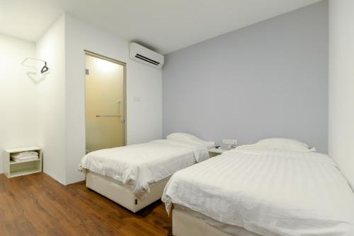 Katil atau katil-katil dalam bilik di Fumah Hotel Kepong