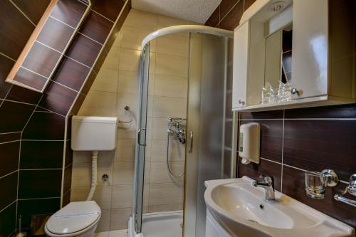 Ванная комната в Vila Hit
