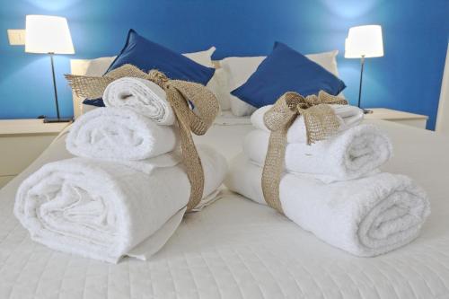 Postel nebo postele na pokoji v ubytování B&B POGGIO DEL SOLE