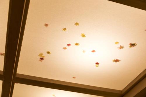a ceiling with stars on it at Guesthouse Raku in Kyoto