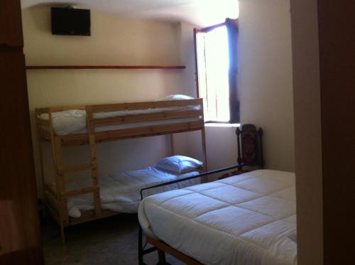 Krevet ili kreveti u jedinici u okviru objekta Casa vacanze da Medardo
