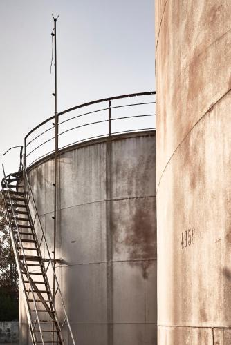 a metal staircase leading up to a large building at Dexamenes Seaside Hotel in Kourouta