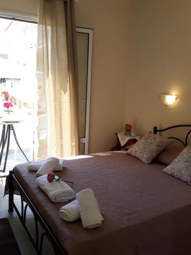 Postel nebo postele na pokoji v ubytování Studio Vasilis