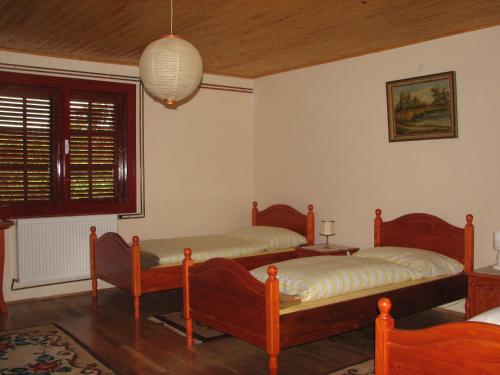 Una cama o camas en una habitación de Pension Magnolia 1