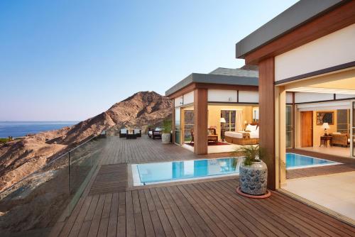 a villa with a view of the ocean at Orchid Eilat Hotel in Eilat