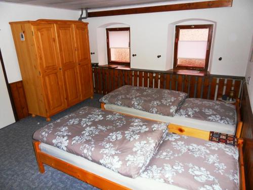 Llit o llits en una habitació de Gästezimmer Zittau - Bed & Breakfast