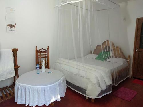 Een bed of bedden in een kamer bij Homeaway Homestay Hatton