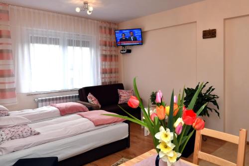 Postel nebo postele na pokoji v ubytování Zator Apartamenty Weekend