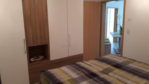 Ένα ή περισσότερα κρεβάτια σε δωμάτιο στο Ferienwohnung Seyser