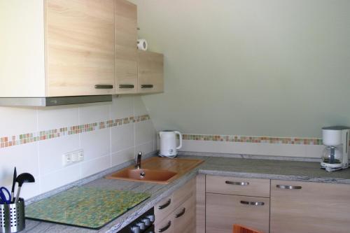 Kuchyň nebo kuchyňský kout v ubytování Lotsenhaus