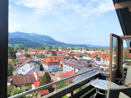 a view of a city from a balcony at Sanosueno 1 in Sonthofen