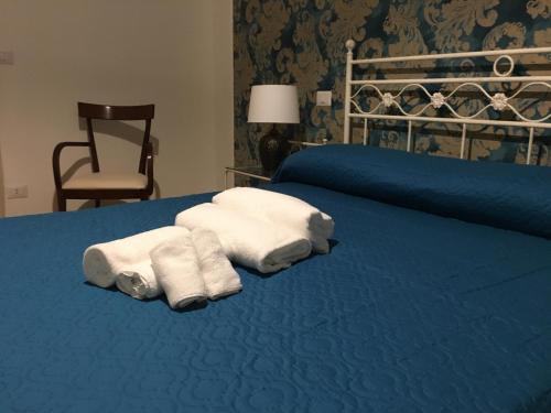Katil atau katil-katil dalam bilik di Suberito rooms&bar