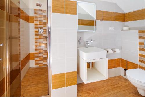 Koupelna v ubytování Penzion Lesni