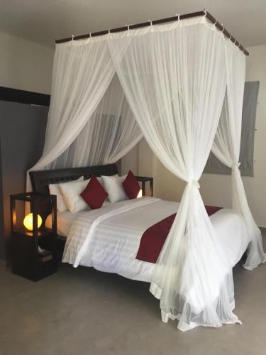 Кровать или кровати в номере Villa Surga