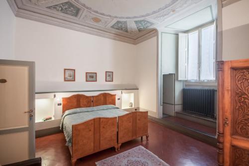 Łóżko lub łóżka w pokoju w obiekcie Casa Rovai Guest House
