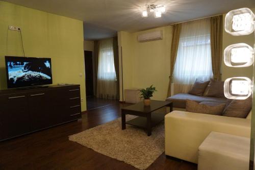 Villa Prestigeにあるテレビまたはエンターテインメントセンター