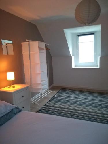 Postel nebo postele na pokoji v ubytování La Maison de Leonie