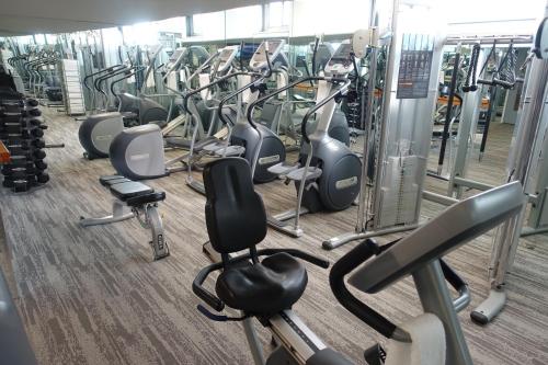 a gym filled with lots of cardio equipment at State Plaza Hotel in Washington