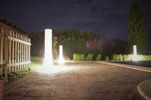 a park at night with lights on the ground at B&B Casa Fanny Riviera Del Conero in Loreto