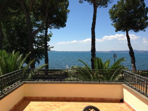 a view from the balcony of a house overlooking the ocean at Hotel Holiday Sul Lago in Bolsena
