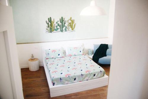 Ένα ή περισσότερα κρεβάτια σε δωμάτιο στο B&B A Casa di Giulia