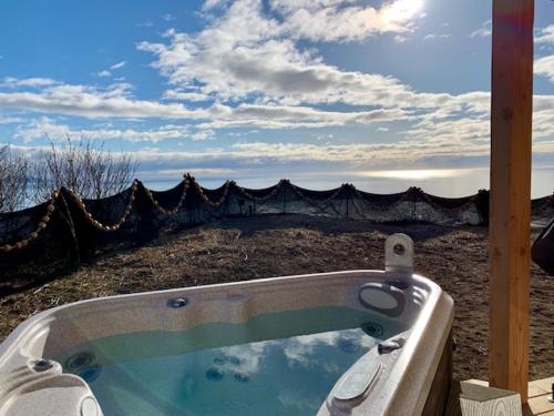 a jacuzzi tub with a view at Baycrest Lodge in Homer