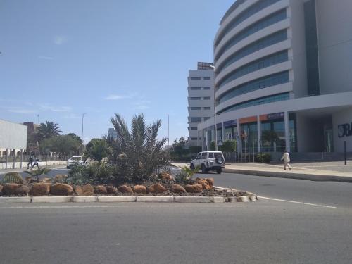 a street in front of a building with a building at Ciza e Rose in Portela