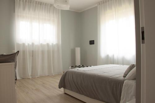 Posteľ alebo postele v izbe v ubytovaní LG apartment