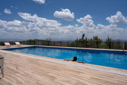 Bazén v ubytování Mezena Resort & SPA nebo v jeho okolí