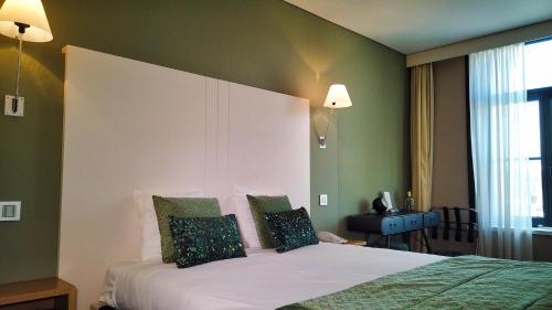 Voodi või voodid majutusasutuse Hotel Bliss toas