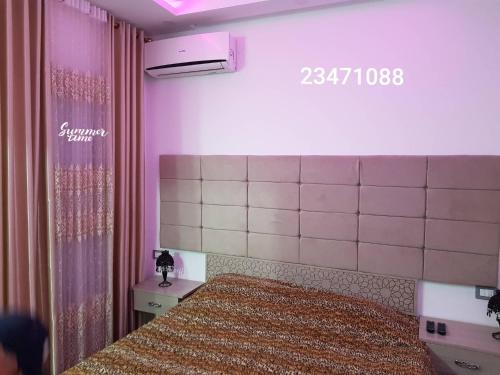 Postel nebo postele na pokoji v ubytování APPARTEMENT "DINA" Kélibia