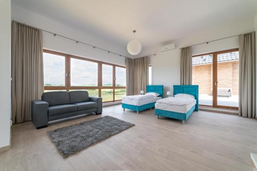 Зона вітальні в Apartamenty Mazury Golf & Country Club