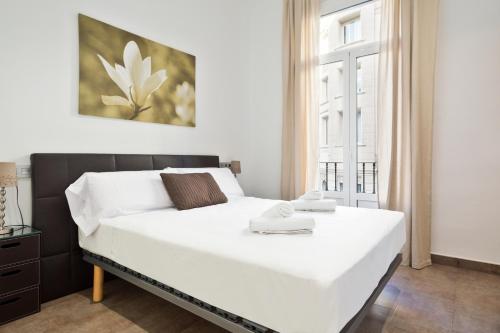 Postel nebo postele na pokoji v ubytování Stay U-nique Apartments Eixample Center
