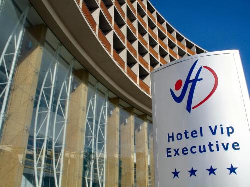 a sign in front of a hotel trigevev centre at VIP Executive Azores Hotel in Ponta Delgada