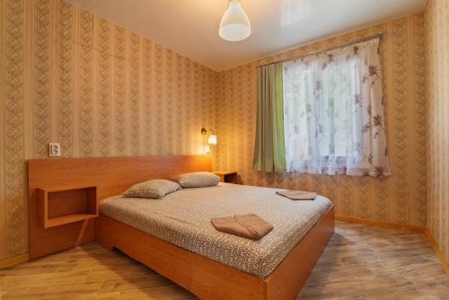 מיטה או מיטות בחדר ב-Elmona Villas
