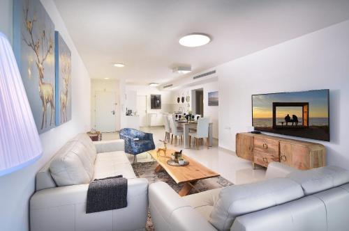 Ariston luxury Garden Apartment with a Pool