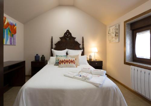 Ένα ή περισσότερα κρεβάτια σε δωμάτιο στο Casa A Marchanta