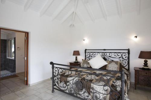 Ein Bett oder Betten in einem Zimmer der Unterkunft Dream Villa Terres Basses 543
