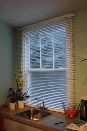 a kitchen counter with a sink and a window at Cherubs Nest in Dartmouth