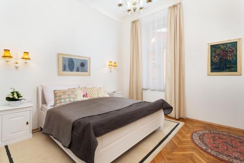 Postel nebo postele na pokoji v ubytování Hip Apartments at Jewish Quarter
