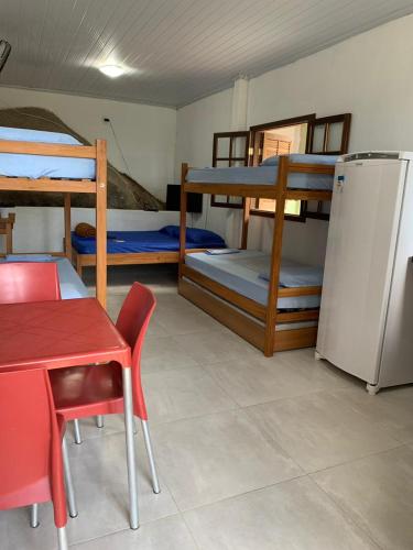 Cama o camas de una habitación en Flats Alto das Pedras
