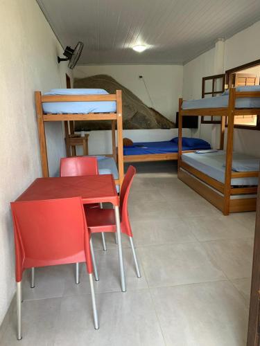 Cama o camas de una habitación en Flats Alto das Pedras