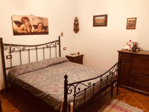 A bed or beds in a room at 50 sfumature dell'Arcobaleno
