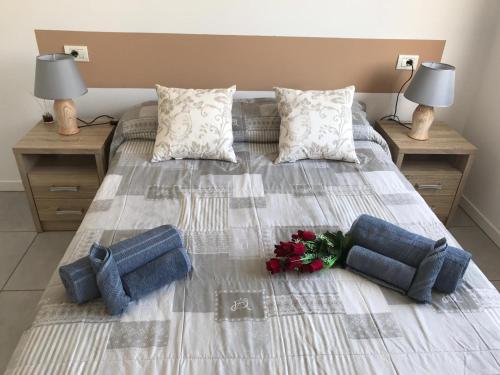 Ένα ή περισσότερα κρεβάτια σε δωμάτιο στο Las Galletas Vista al mar con Wifi