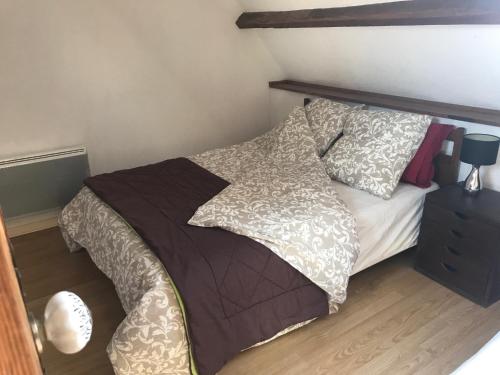Postel nebo postele na pokoji v ubytování Normandia